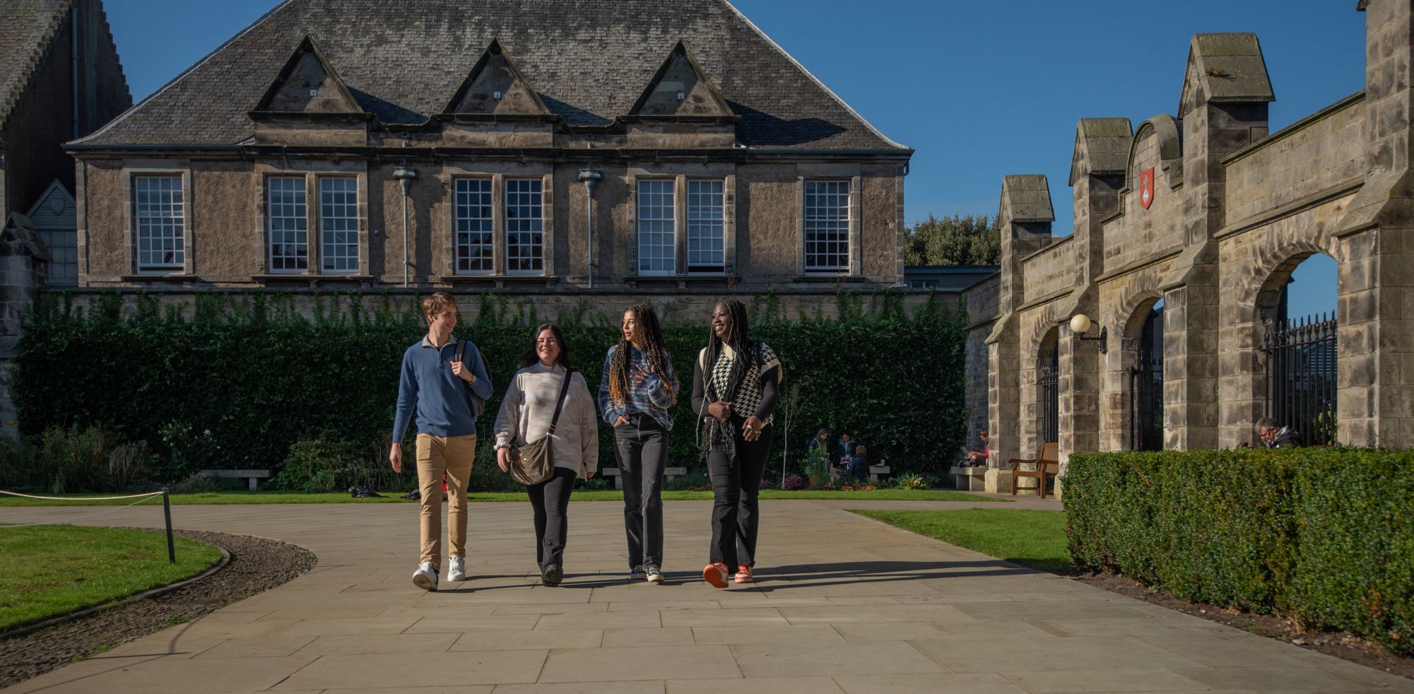 Students St Salvator's Quadrangle_University of St Andrews Students walking in St Salvator's Quadrangle, University of St Andrews.jpg